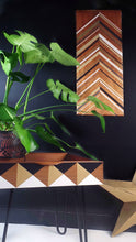 Salvaged vintage wood wall hanging with geometric design